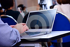 Business people working with laptops in seminars