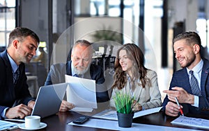 Business people working on new project at modern office