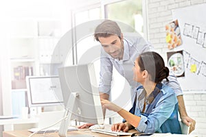 Business people working odesktop computer