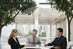 Business People Working At Office Cafe