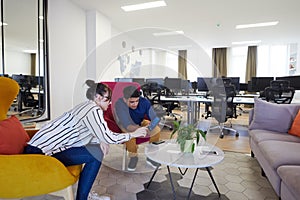 Business people Working In Relaxation Area Of Modern Office