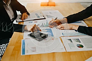 Business people working on table with a finance data on paper document