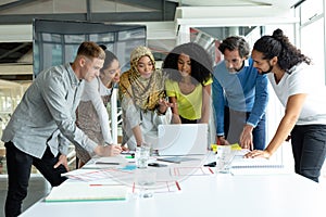 Business people working together on laptop at conference room in a modern office