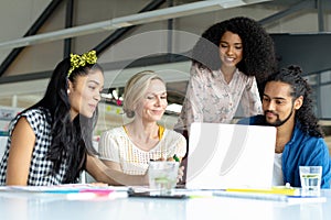 Business people working together on laptop at conference room in a modern office