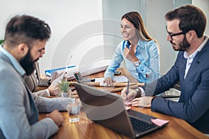 Business people working together on project in office
