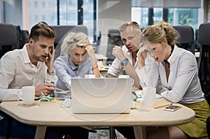 Business people are worried about finance results photo