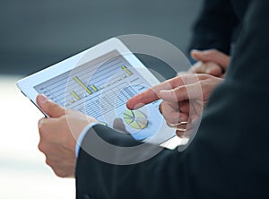 Business person analyzing financial statistics