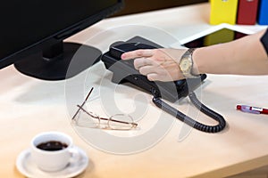 Business Person Hand taking Office Telephone