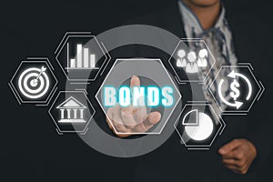 Business person hand touching bond icon on virtual screen, Trade Market Network