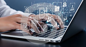 Business Person Hands Typing on Laptop with Digital Document Management and Data Analytics Icons