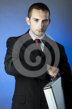 Business person holding a briefcase