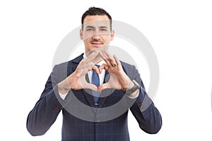 Business person making hearth shape with fingers as love concept