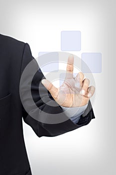 Business person pushing symbols on a touch screen