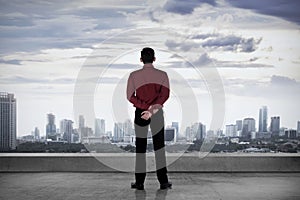 Business Person Standing On The Rooftop