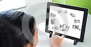 Business person touching graphics on tablet PC