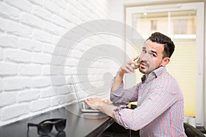 Business phone call in home office