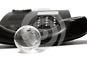 Business phone and glass globe