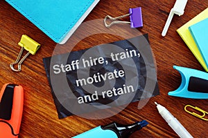 Business photo shows hand written text Staff hire, train, motivate and retain