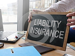 Business photo shows printed text liability isurance photo