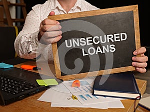 Business photo shows printed text unsecured loans photo