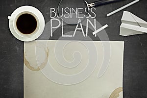 Business plan concept on black blackboard with