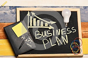 Business plan concept. Blackboard with business chart