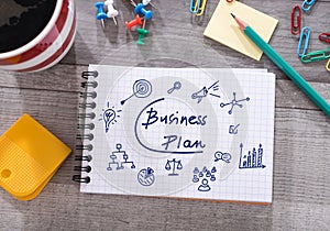 Business plan concept on a notepad