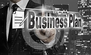 Business plan is shown by businessman concept