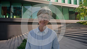 Business portrait adult Caucasian middle-aged 50s businesswoman in glasses mature old female lady successful woman