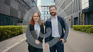 Business portrait in city downtown Caucasian happy smiling businesspeople businesswoman businessman corporate man woman