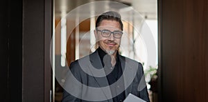 Business portrait - Happy businessman in office