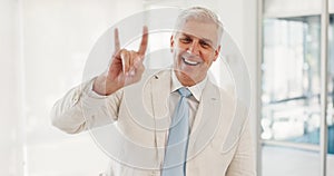 Business, portrait and senior man with rock hands in office happy for ceo, success or motivation, leadership and mindset