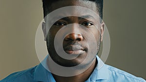 Business portrait serious african american man middle-aged male in office looking at camera close-up headshot sad face