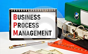 Business process management. The text label in the planning notebook.