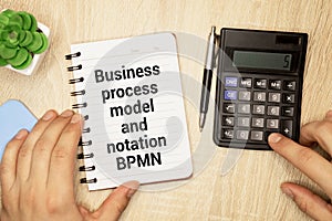 Business process model and notation BPMN is shown using a text