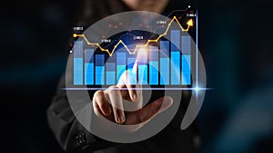 Business Professional Interacting with Digital Analytics Display Featuring Graphs and Data Visualizations in a Modern