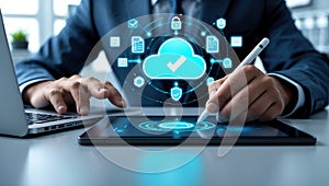 Business professional using tablet and stylus with cloud computing interface and icons technology and data management concept