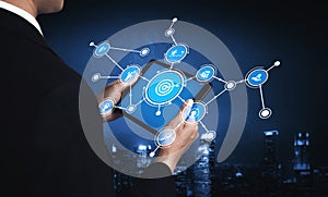 Business professional using tablet technology to access digital data visualization with network connections in urban