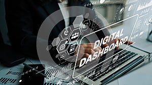 Business Professional Working on Laptop with Digital Dashboard Visualization and Analytics Interface in Modern Workspace