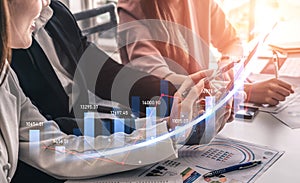 Businesspeople Analyzing Financial Data on Digital Devices with Graphs and Charts in Modern Office Environment Scalp