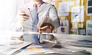 Business professionals. Group of young confident business people analyzing data using computer while spending time in the office