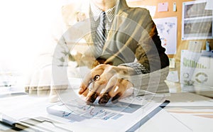 Business professionals. Group of young confident business people analyzing data using computer while spending time in the office