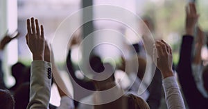 Business professionals raising their hands in a business seminar 4k