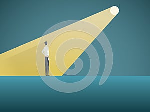 Business recruitment or hiring vector concept. Businessman standing in spotlight or searchlight as symbol of unique photo