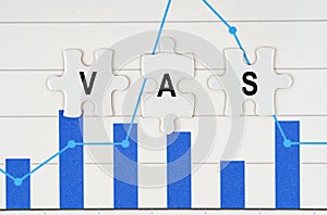 On business reports - diagrams are puzzles with the inscription - VAS