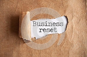 Business reset torn paper reveal