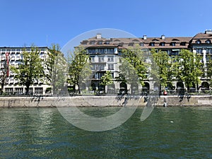 Business and residential buildings along the Limmat River in the city of Zurich