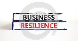 Business resilience symbol. Concept word Business resilience typed on books. Beautiful white table white background. Business and