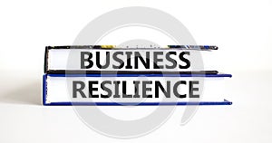 Business resilience symbol. Concept word Business resilience typed on books. Beautiful white table white background. Business and