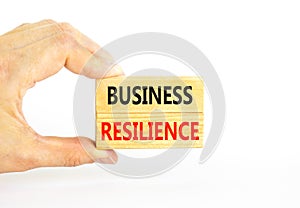 Business resilience symbol. Concept word Business resilience typed on wooden blocks. Beautiful white table white background.